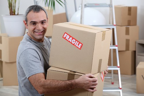 Staff member reviewing safety procedures in a storage facility