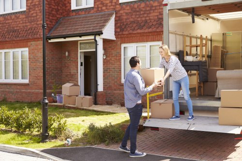 Commercial office relocation with careful equipment handling in Longlands