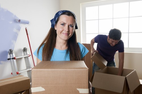 Household items packed for short-term storage during a move in Longlands