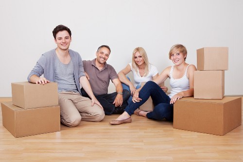 Removal team loading furniture in Longlands